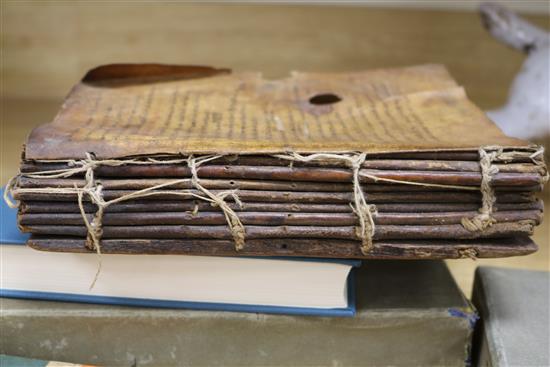 A parchment copy of The Koran and sundry bindings